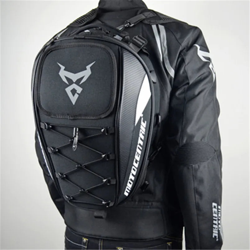 Motocentric motorcycle tail bag worn as backpack on rider