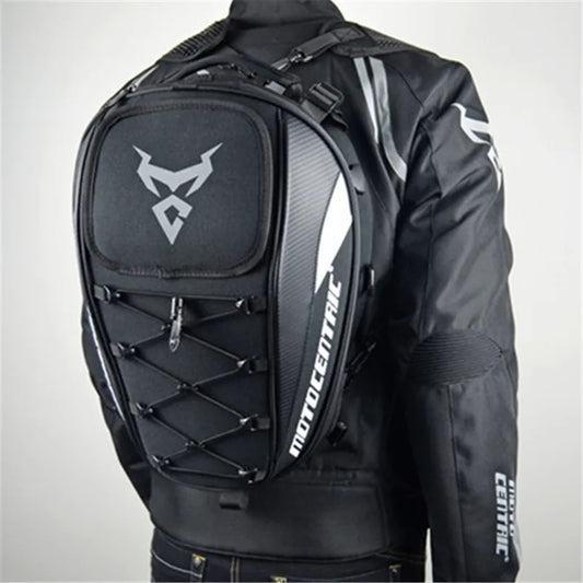 Motocentric motorcycle tail bag worn as backpack on rider