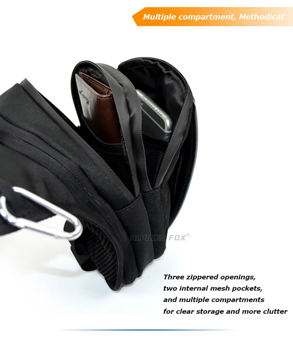 Motocentric leg bag open showing three zippered compartments and mesh pockets