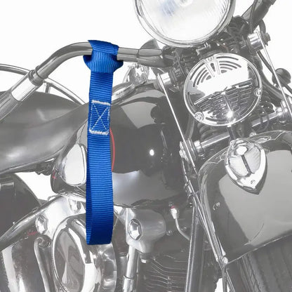 Blue soft loop tie down strap mounted on motorcycle fork